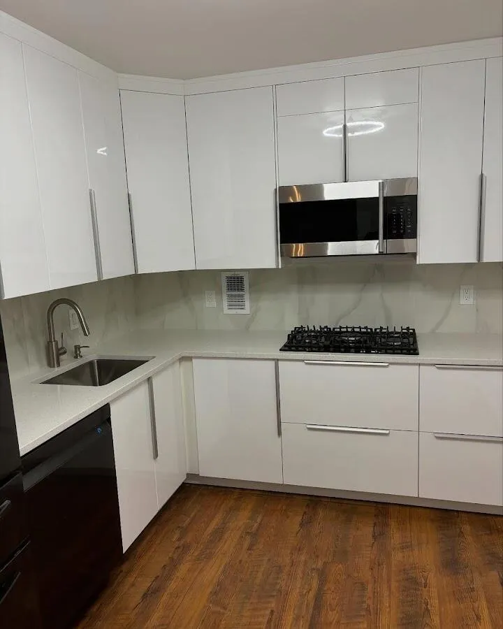 Restored kitchen with white cabinets after water damage in Federal Heights
